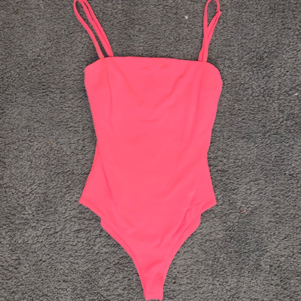 Hot pink bodysuit from Princess Polly